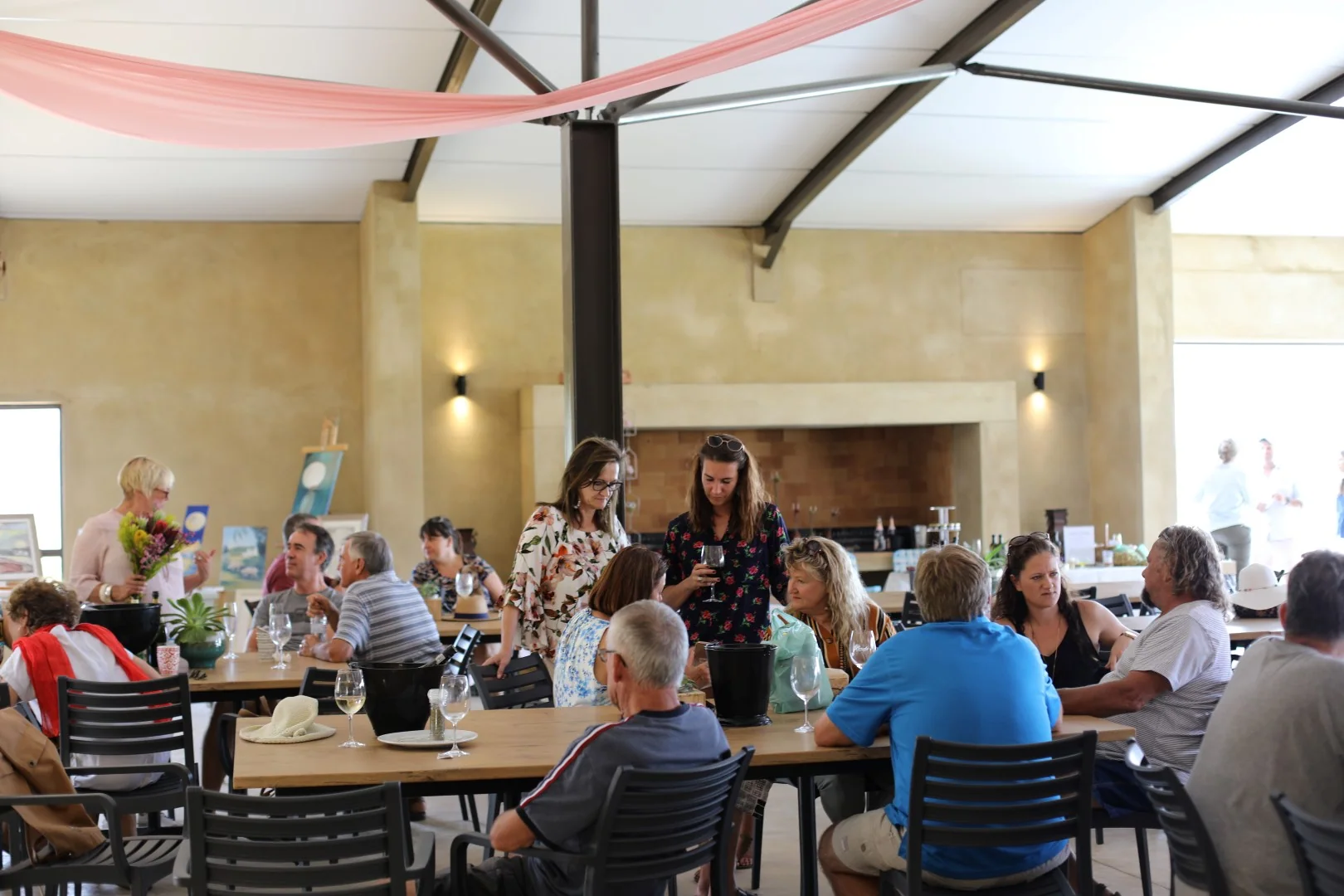 Guests gathered across the Blue Crane Bistro dining room at Lords Winery.